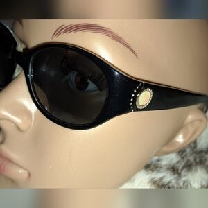 Large Rounded Liz Claiborne Sunglasses with embellished emblem on Arms. Black.